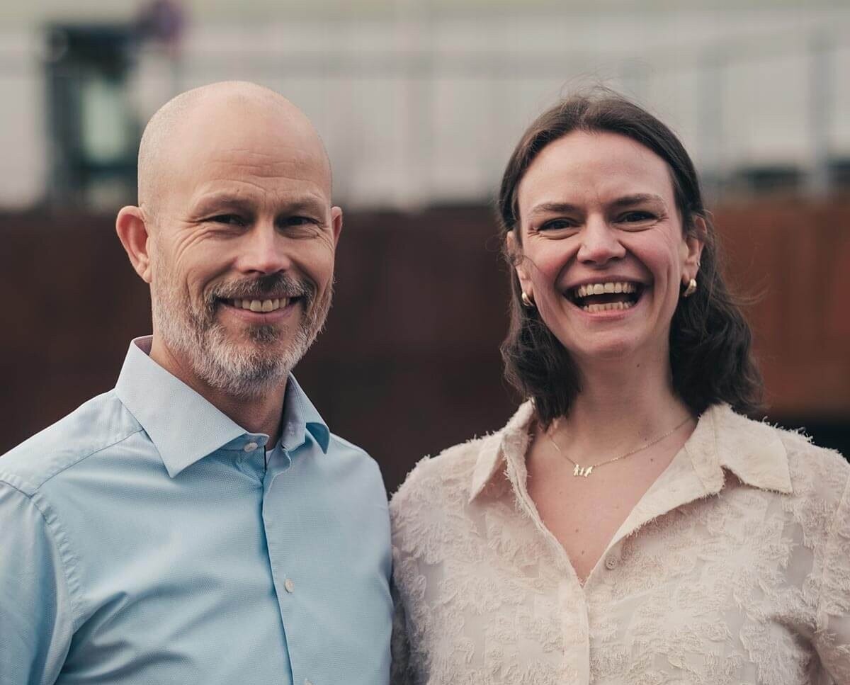 Friendly, smiling man and woman